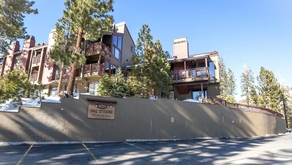 a view of a house with a street