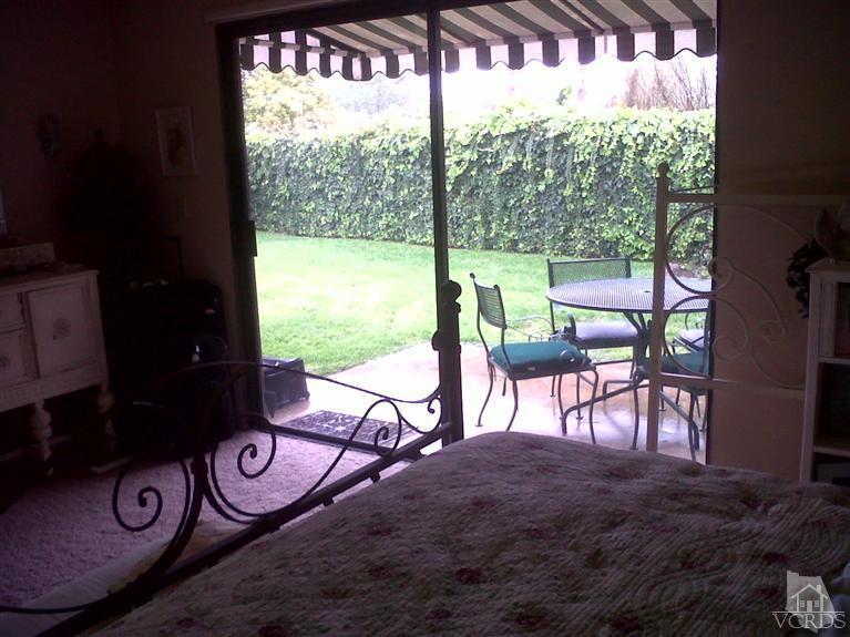 596 Fresh Meadows Road Simi Valley, CA 93065 - Photo 12 of 16 a view of a porch with furniture and yard