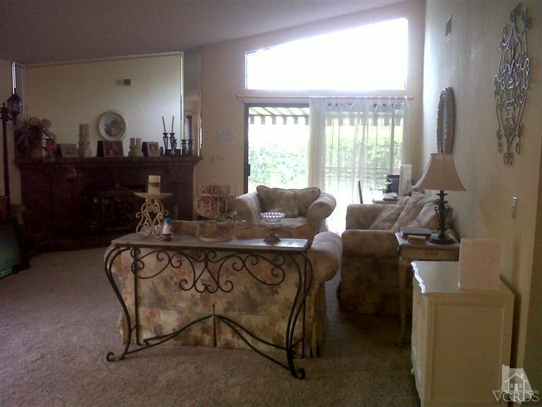 596 Fresh Meadows Road Simi Valley, CA 93065 - Photo 4 of 16 a living room with furniture and a large window