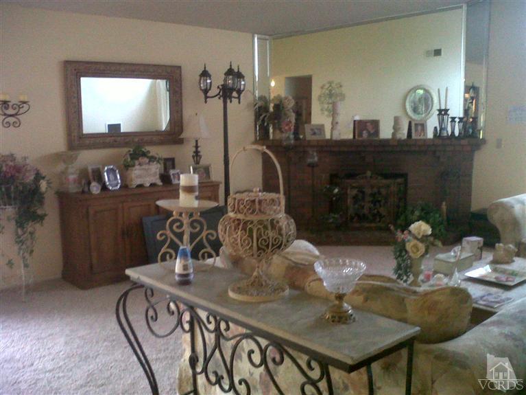 596 Fresh Meadows Road Simi Valley, CA 93065 - Photo 5 of 16 a dining room with furniture and wooden floor