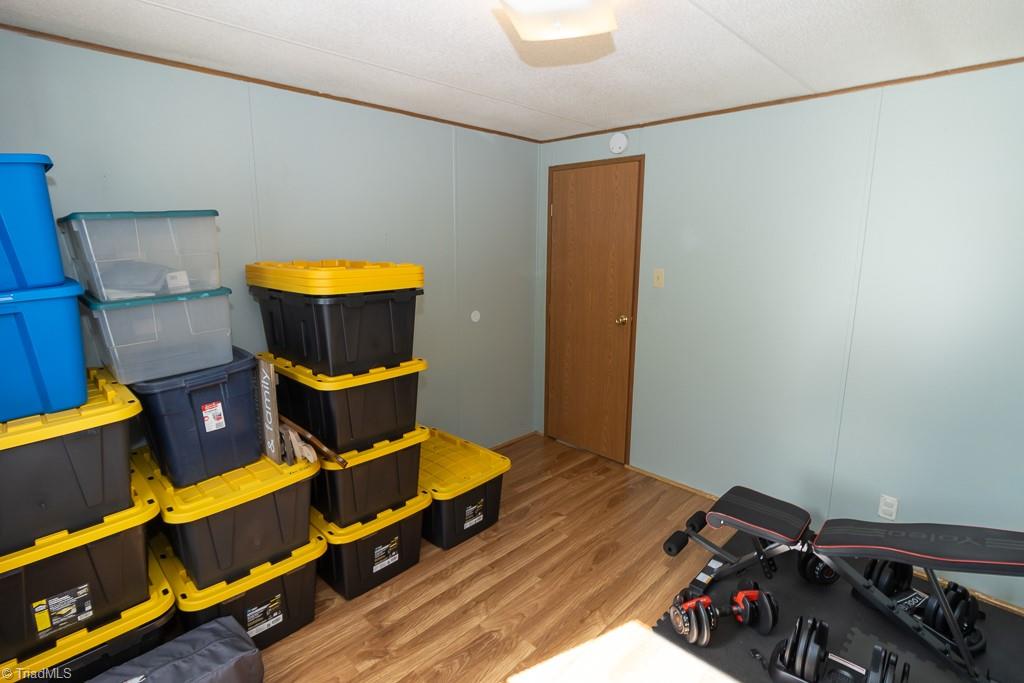 8280 Stafford Mill Road Oak Ridge, NC 27310 - Photo 29 of 40 SELLER IS USING THE 3RD BEDROOM FOR STROAGE PRIOR TO MOVING.