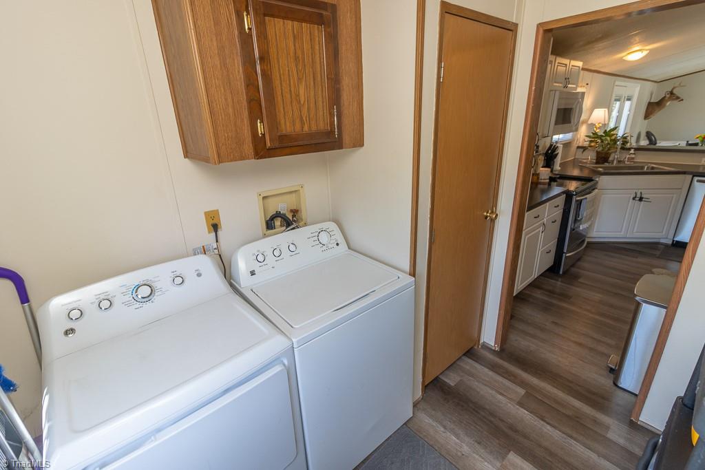 8280 Stafford Mill Road Oak Ridge, NC 27310 - Photo 30 of 40 LAUNDRY ROOML WITH CLOSET... WASHER AND DRYER REMAIN WITH THE HOME