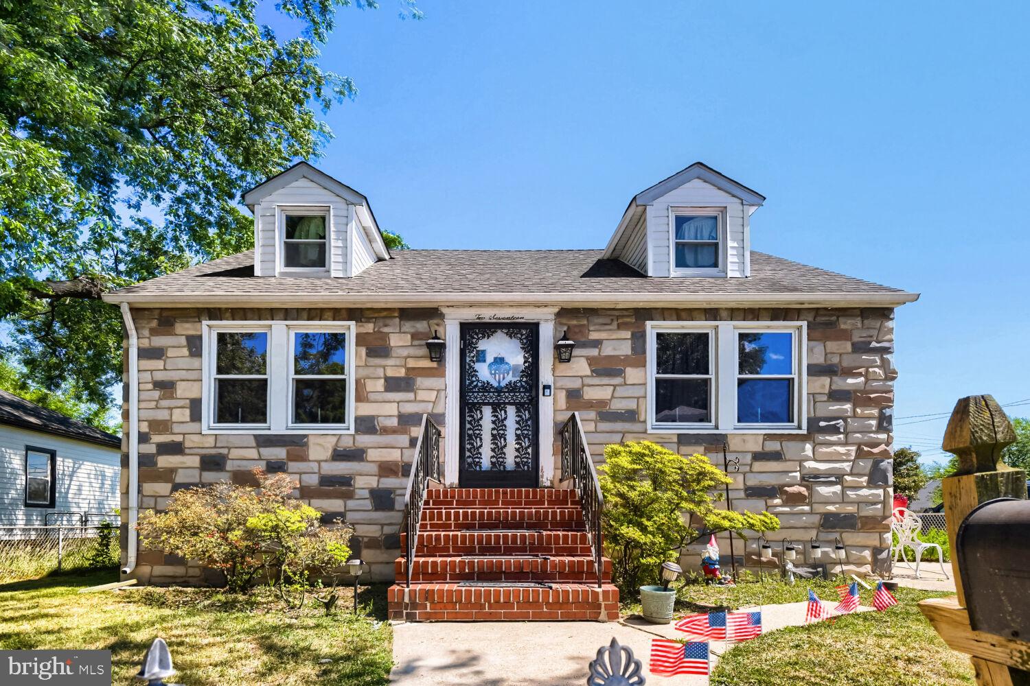 217 Doris Avenue Baltimore, MD 21225 - Photo 2 of 16 a front view of a house with patio