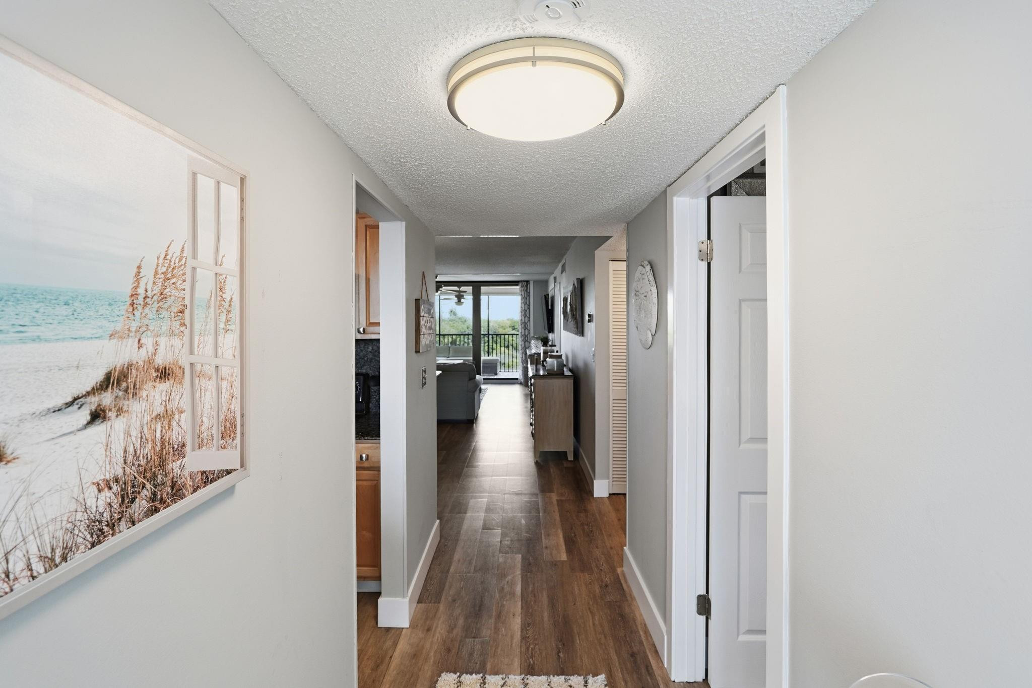 1629 Riverview Road, Unit 620 Deerfield Beach, FL 33441 - Photo 6 of 42 Entry with artwork and an entry table