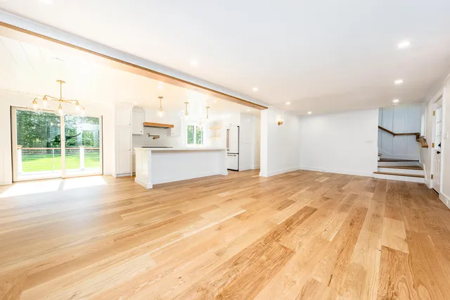 a bathroom with a sink and a window