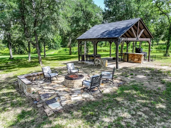 a view of lake with green space