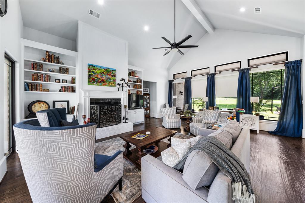 365 Private Road 5529 Point, TX 75472 - Photo 16 of 40 a living room with furniture and a fireplace