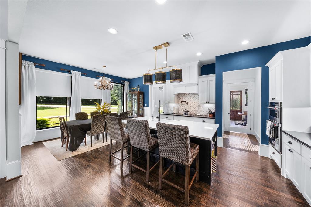 365 Private Road 5529 Point, TX 75472 - Photo 19 of 40 a view of a dining room with furniture window and wooden floor