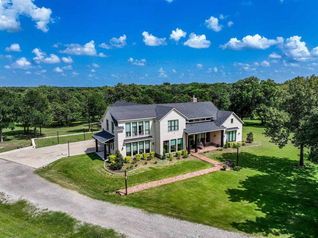 365 Private Road 5529 Point, TX 75472 - Photo 2 of 40 a front view of a house with a yard