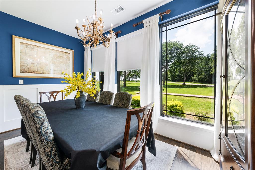 365 Private Road 5529 Point, TX 75472 - Photo 22 of 40 a dining room with furniture a large window and a chandelier