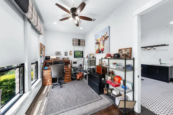 a spacious bathroom with a double vanity sink a mirror a bathtub and a shower