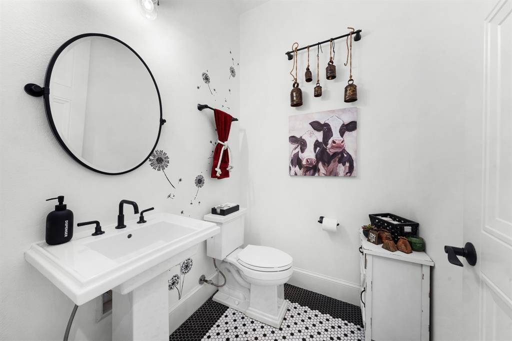 365 Private Road 5529 Point, TX 75472 - Photo 26 of 40 a bathroom with a toilet sink and mirror