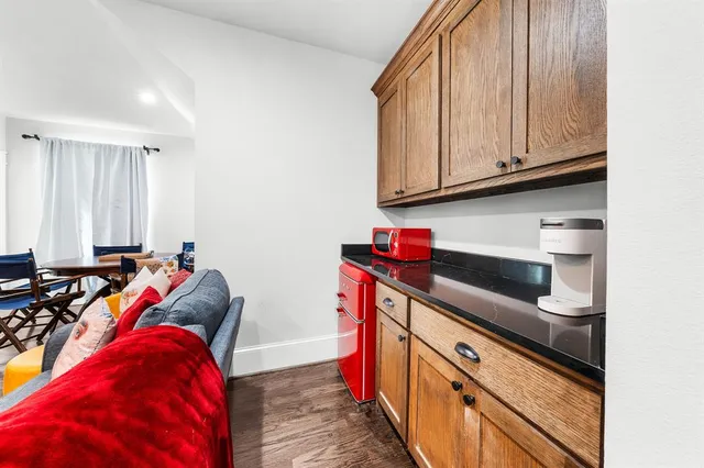 a view of a kitchen with appliances and cabinets