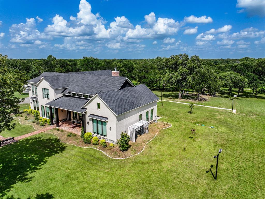 365 Private Road 5529 Point, TX 75472 - Photo 6 of 40 a aerial view of a house with a big yard