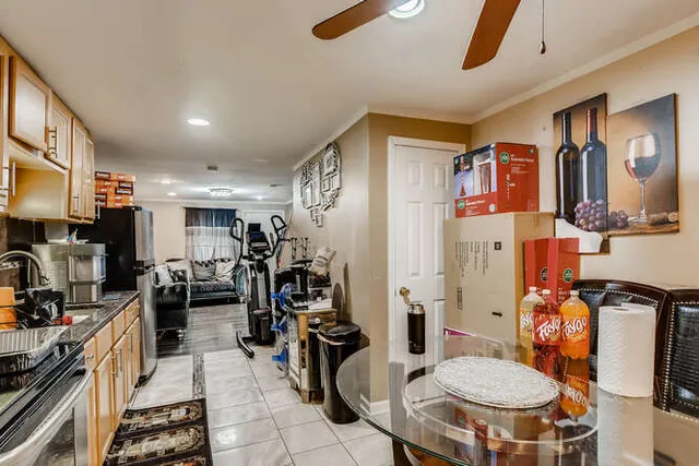 a kitchen with stainless steel appliances granite countertop a stove and a sink