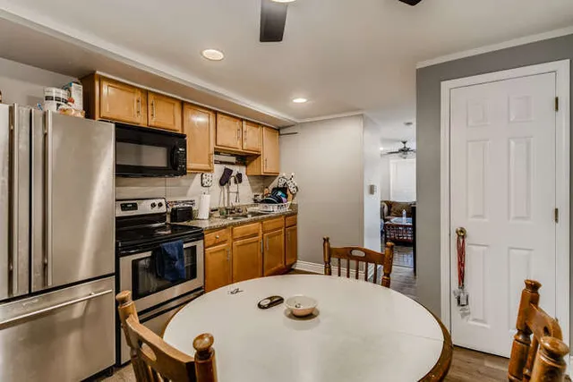 a bedroom with furniture and a window