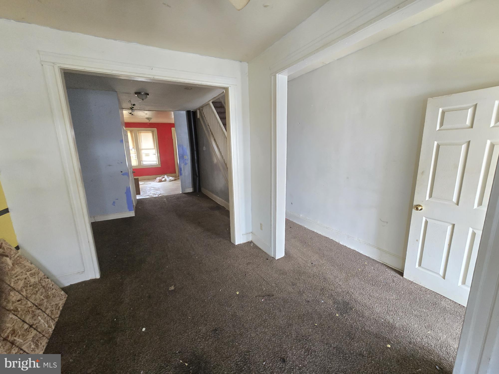 653 Bartlett Avenue Baltimore, MD 21218 - Photo 3 of 14 a view of a hallway with front door