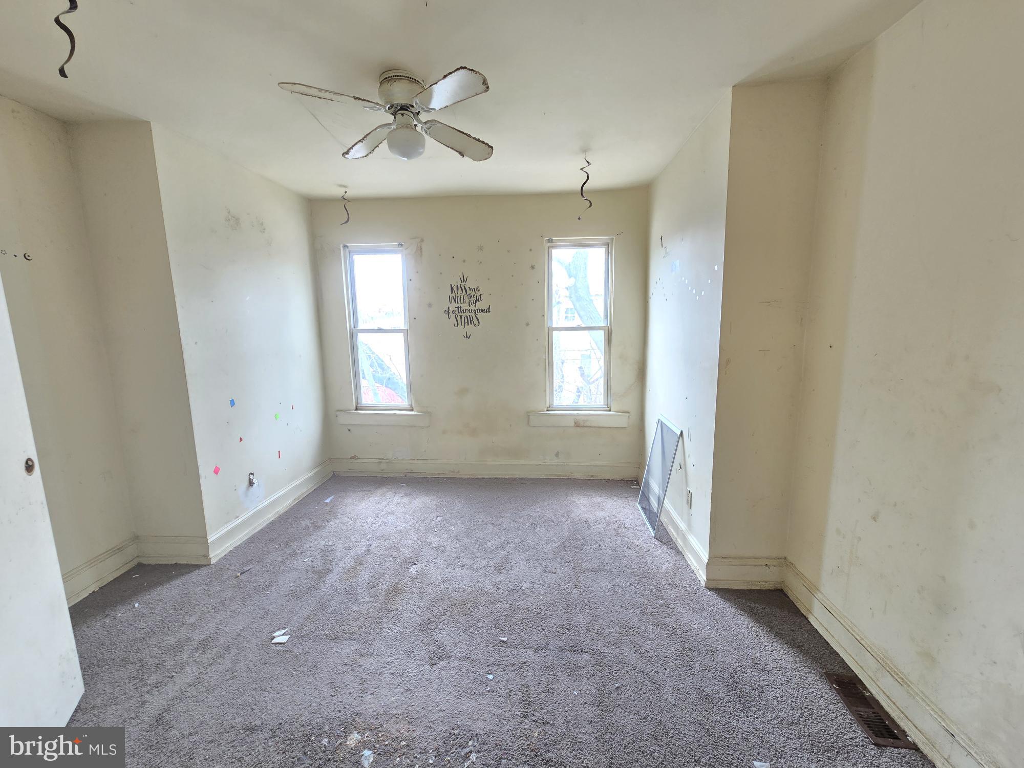 653 Bartlett Avenue Baltimore, MD 21218 - Photo 9 of 14 a view of an empty room with a window