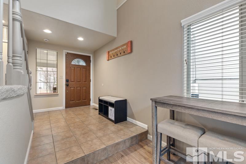 7595 Whimbleton Way Reno, NV 89511 - Photo 2 of 36 a view of workspace with furniture and window