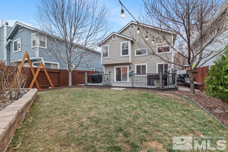 7595 Whimbleton Way Reno, NV 89511 - Photo 23 of 36 a view of a house with a yard
