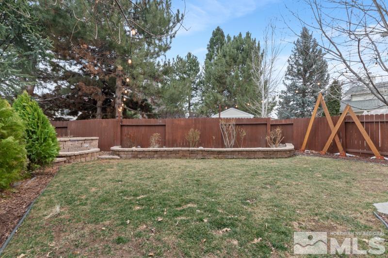7595 Whimbleton Way Reno, NV 89511 - Photo 24 of 36 a backyard of a house