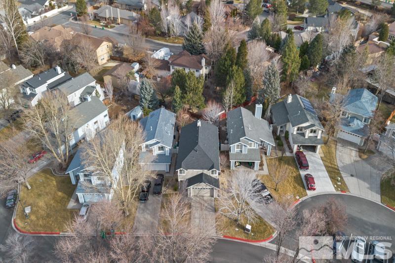 7595 Whimbleton Way Reno, NV 89511 - Photo 26 of 36 an aerial view of residential houses with outdoor space