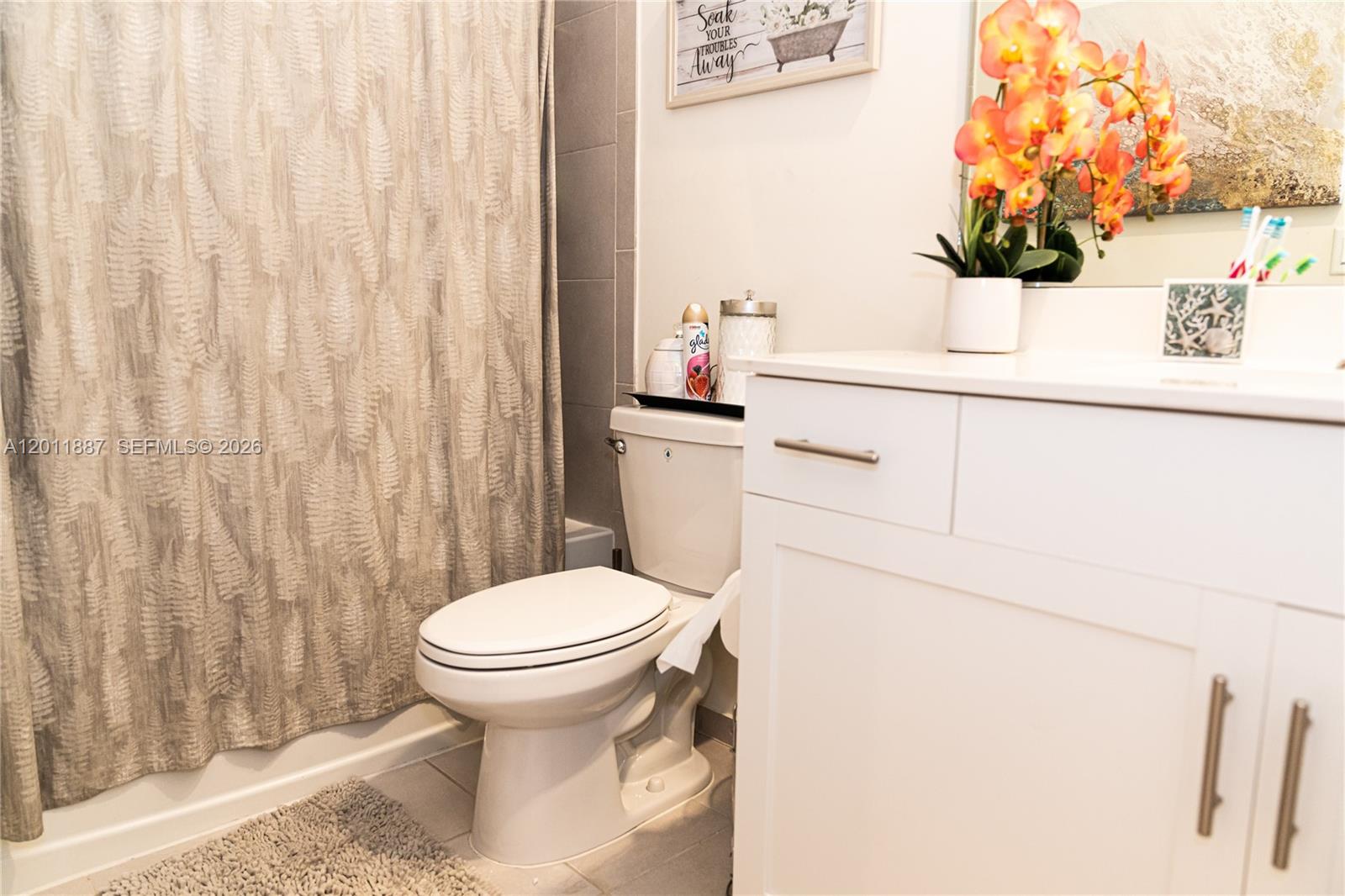 10599 West 33rd Court Hialeah, FL 33018 - Photo 21 of 39 a bathroom with a toilet and a sink