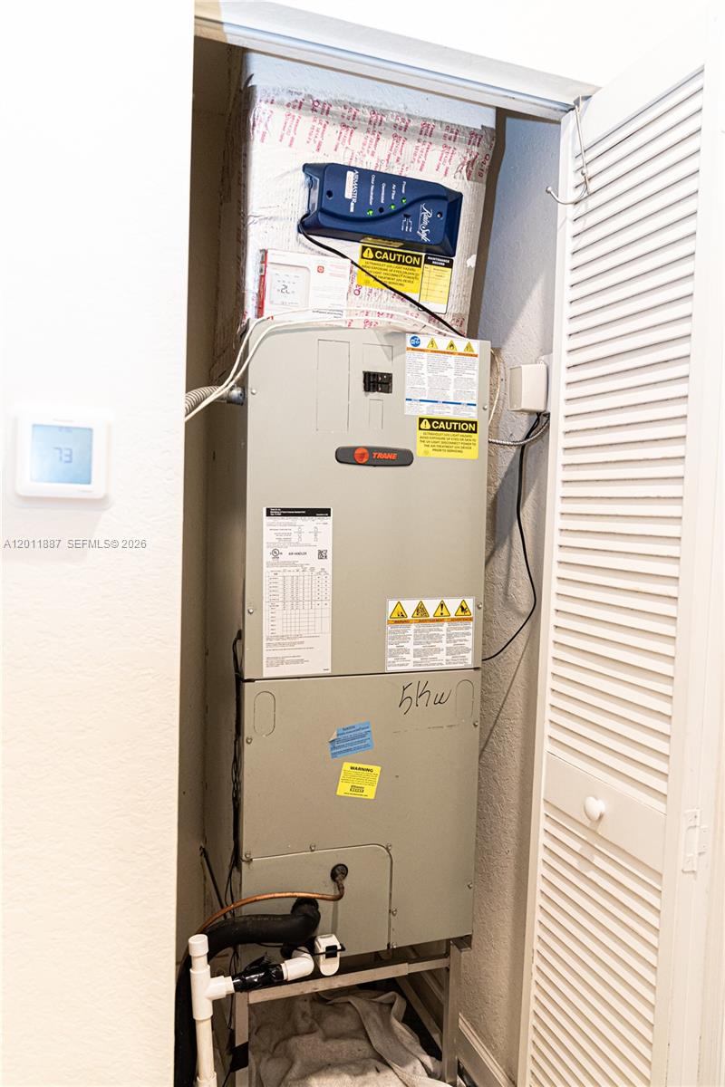 10599 West 33rd Court Hialeah, FL 33018 - Photo 24 of 39 a close up of a white cabinet