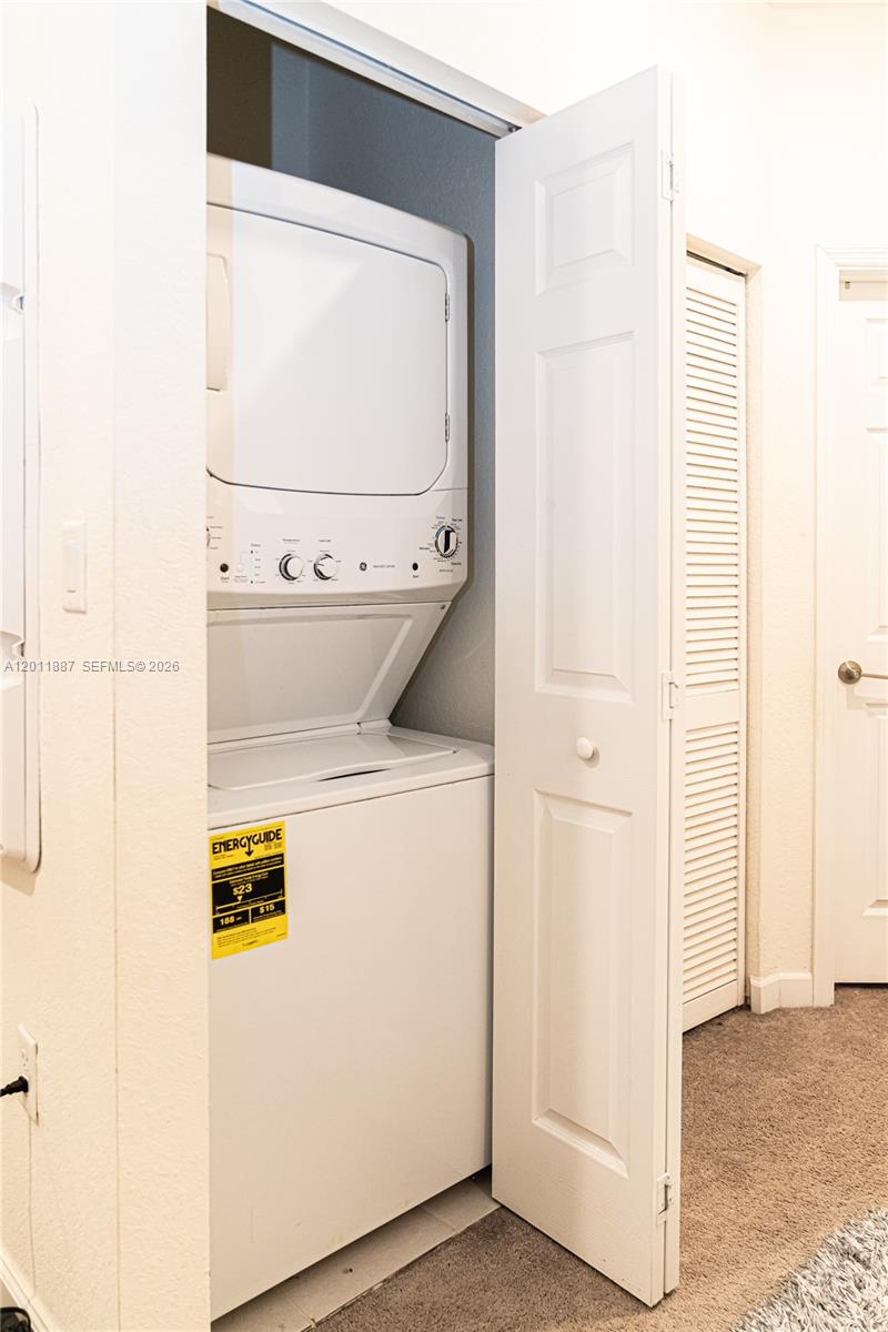 10599 West 33rd Court Hialeah, FL 33018 - Photo 26 of 39 a utility room with dryer and washer