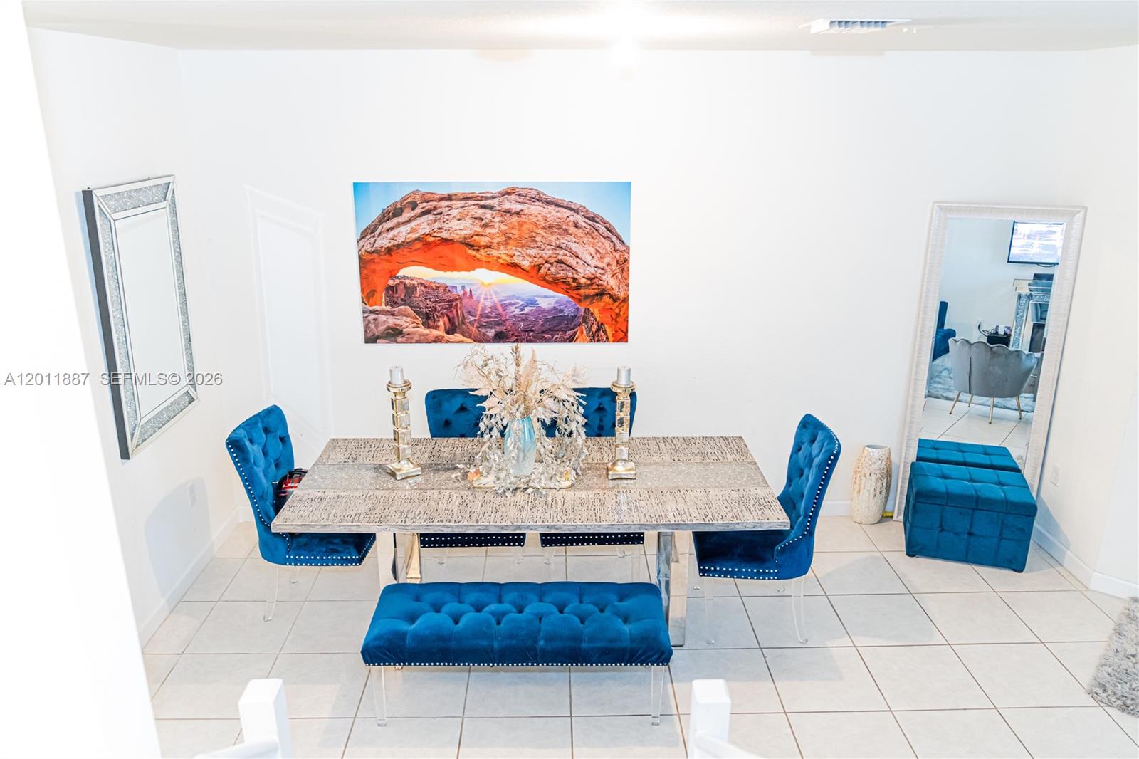 10599 West 33rd Court Hialeah, FL 33018 - Photo 9 of 39 a view of a dining room with furniture
