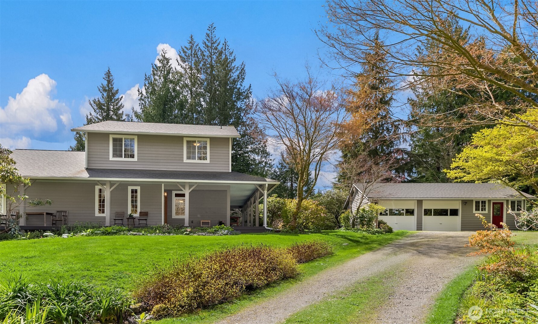 37695 Hansville Road Northeast Hansville, WA 98340 - Photo 5 of 37 front view of a house with a garden