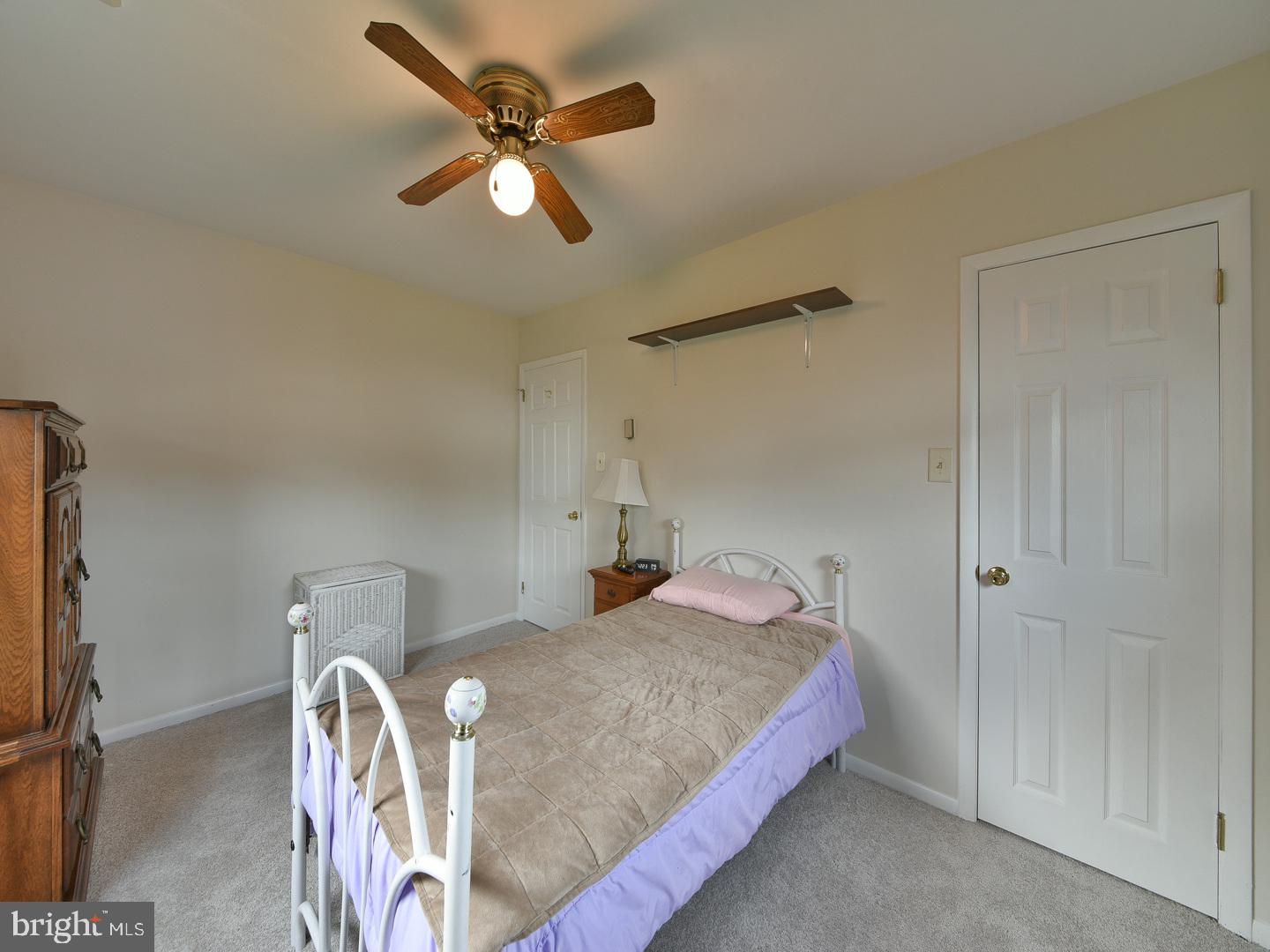127 Ellis Road Willow Grove, PA 19090 - Photo 20 of 38 a bedroom with a bed and ceiling fan