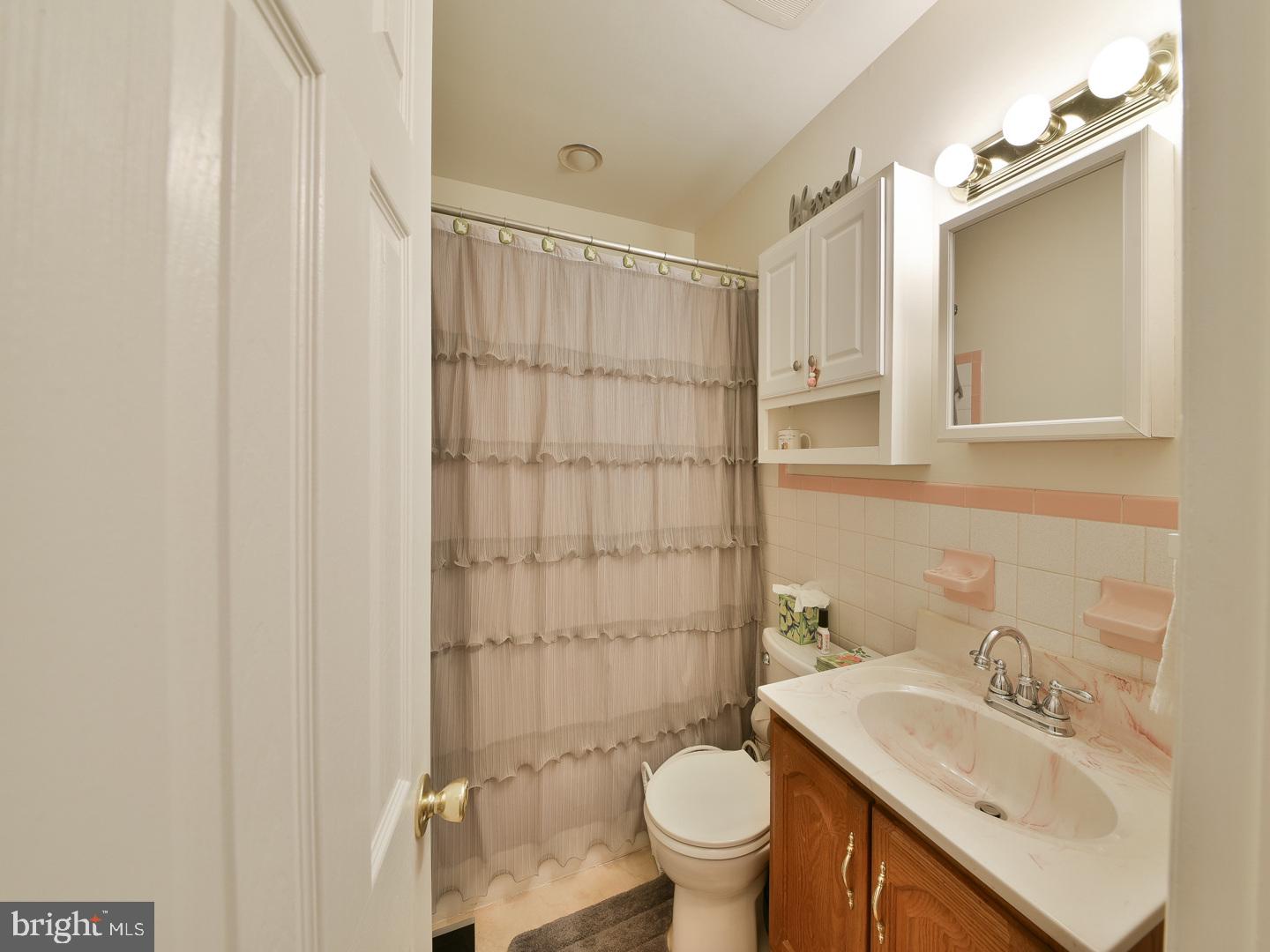 127 Ellis Road Willow Grove, PA 19090 - Photo 21 of 38 a bathroom with a sink toilet and shower