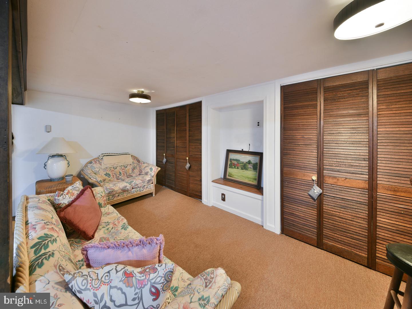 127 Ellis Road Willow Grove, PA 19090 - Photo 25 of 38 a living room with furniture and a flat screen tv