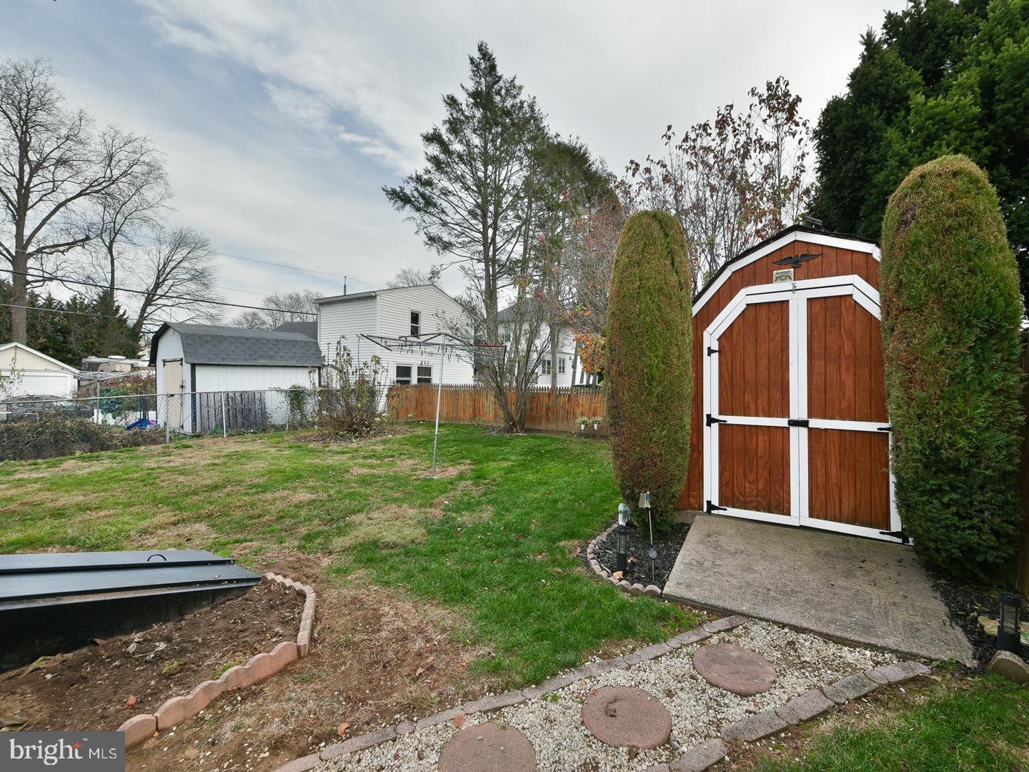 127 Ellis Road Willow Grove, PA 19090 - Photo 37 of 38 a front view of a house with garden
