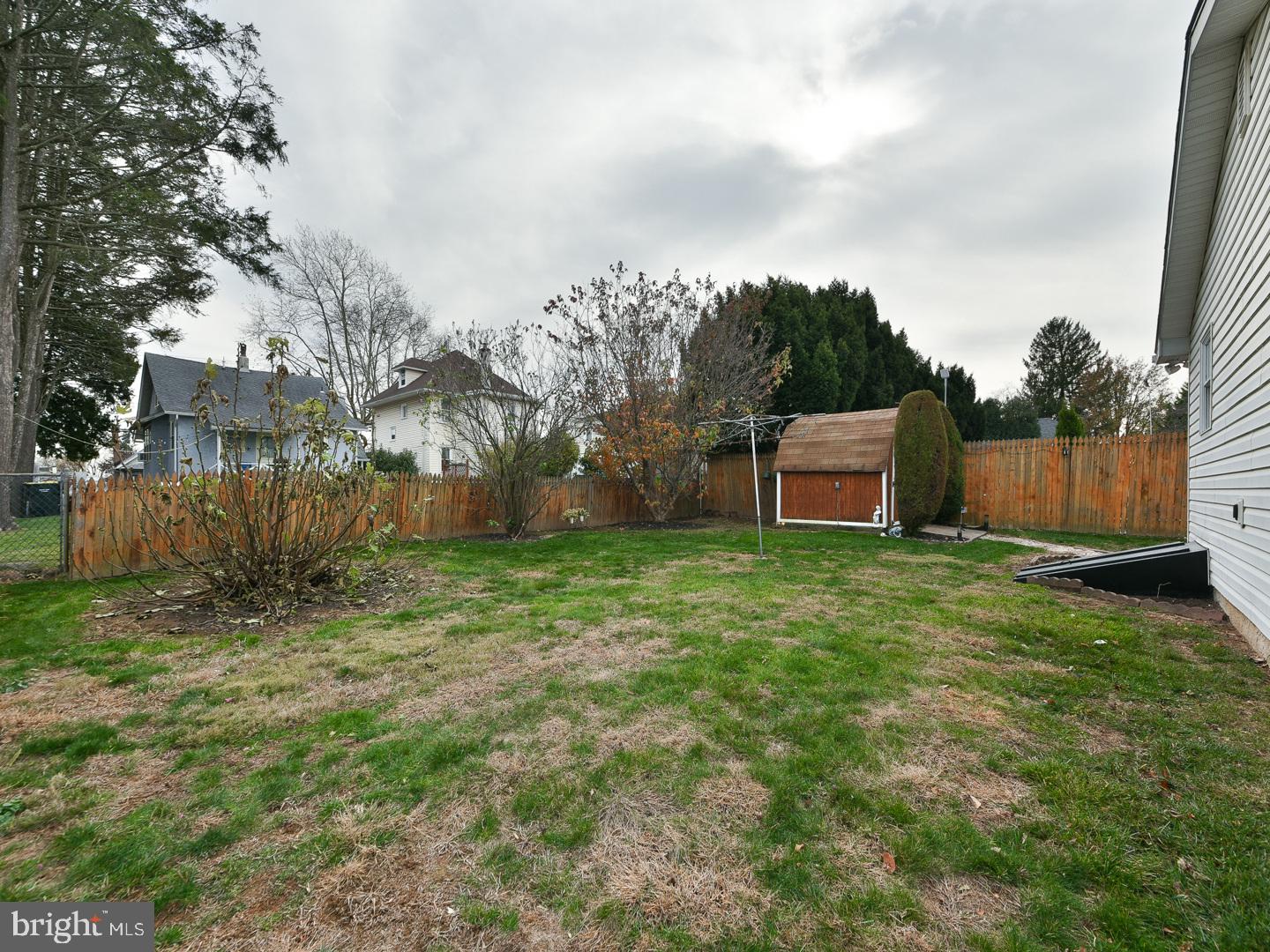 127 Ellis Road Willow Grove, PA 19090 - Photo 38 of 38 a backyard of a house with lots of green space
