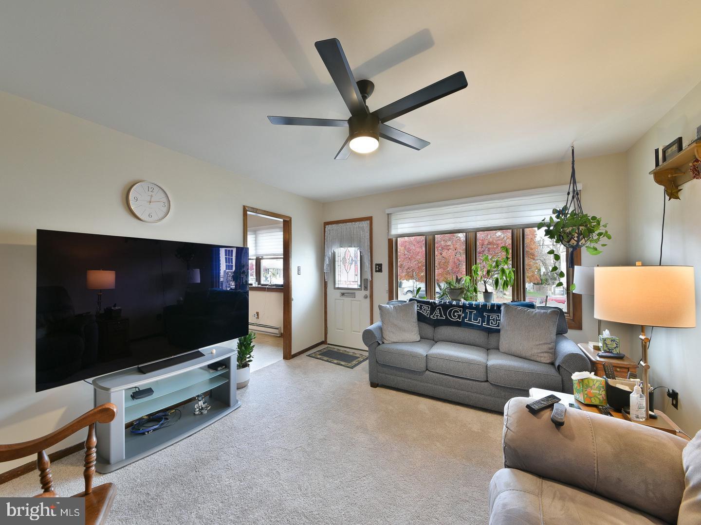 127 Ellis Road Willow Grove, PA 19090 - Photo 8 of 38 a living room with furniture and a flat screen tv
