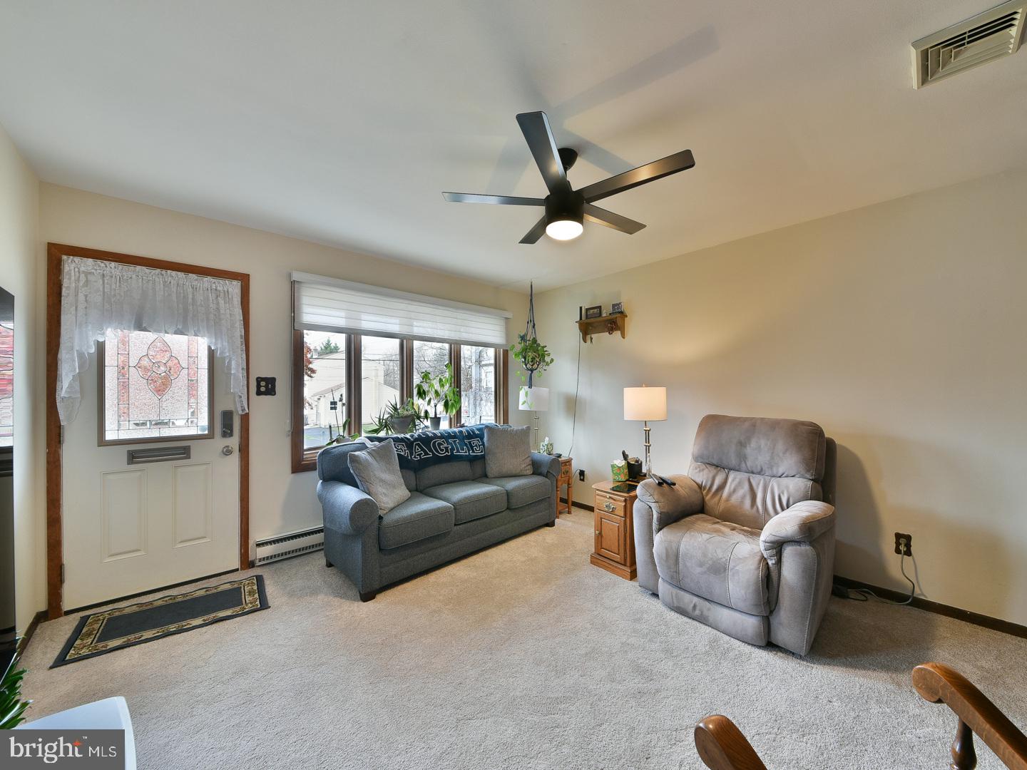 127 Ellis Road Willow Grove, PA 19090 - Photo 9 of 38 a living room with furniture and a large window