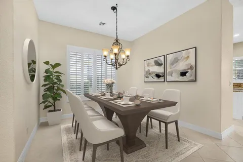 a living room with furniture a rug and a large window