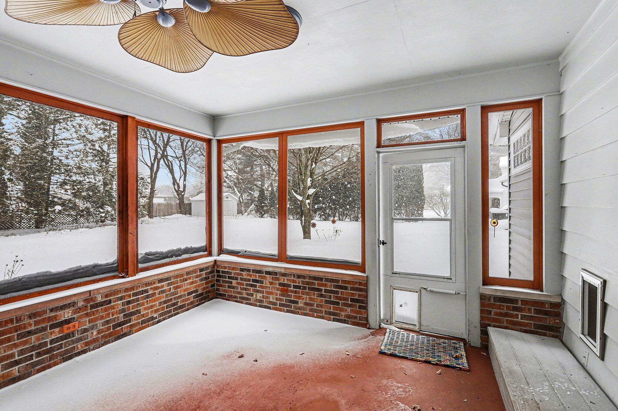 3720 Middlebury Drive Kalamazoo, MI 49006 - Photo 18 of 24 Screened, walkout porch