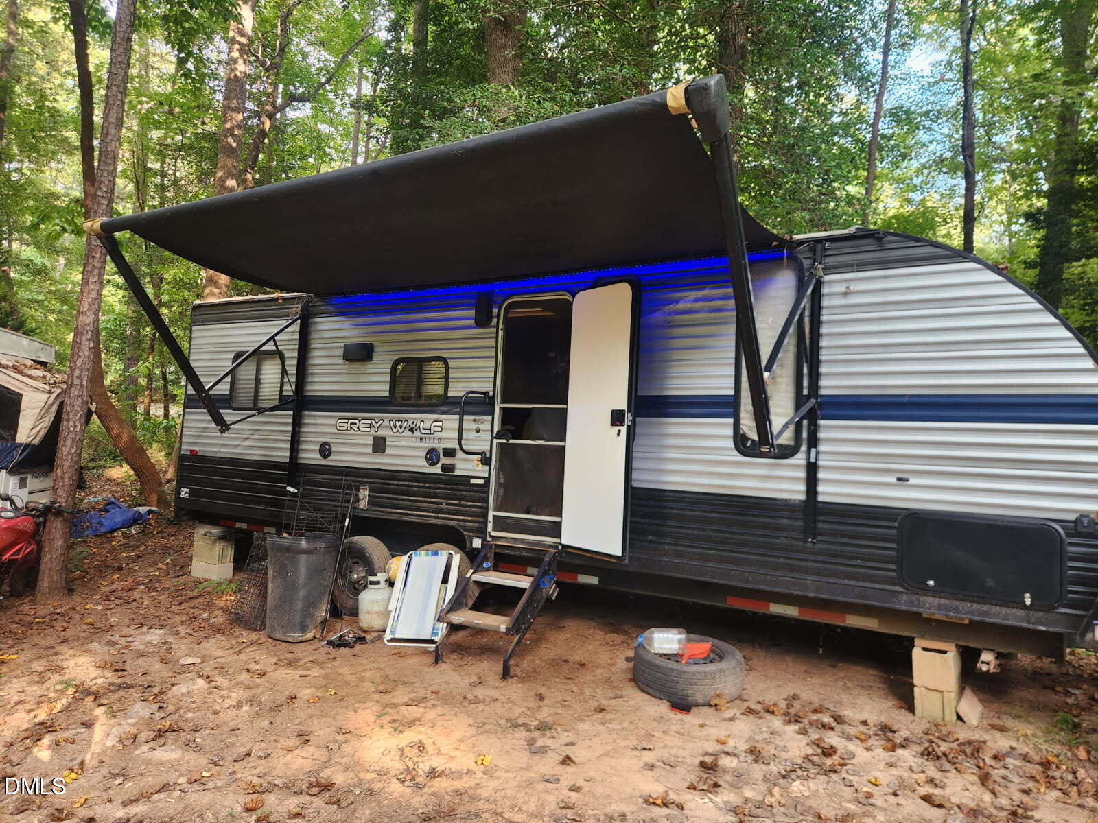 117 Turon Drive Spring Hope, NC 27882 - Photo 2 of 8 a view of a chairs and table in the back yard of the house