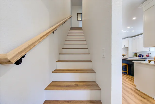 a bathroom with a sink a toilet and a bathtub