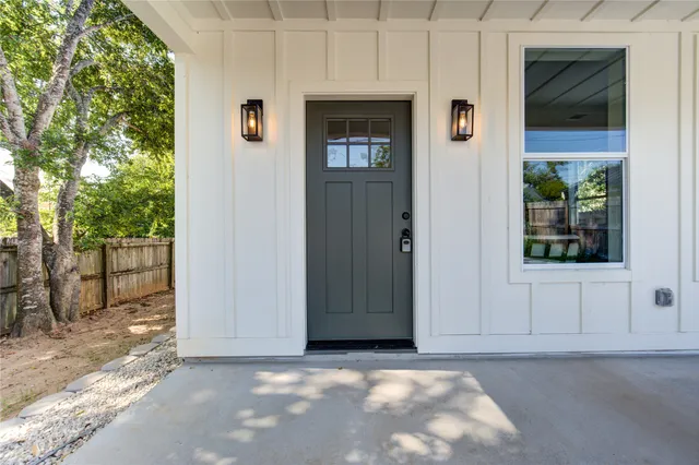 a view of a house with a street