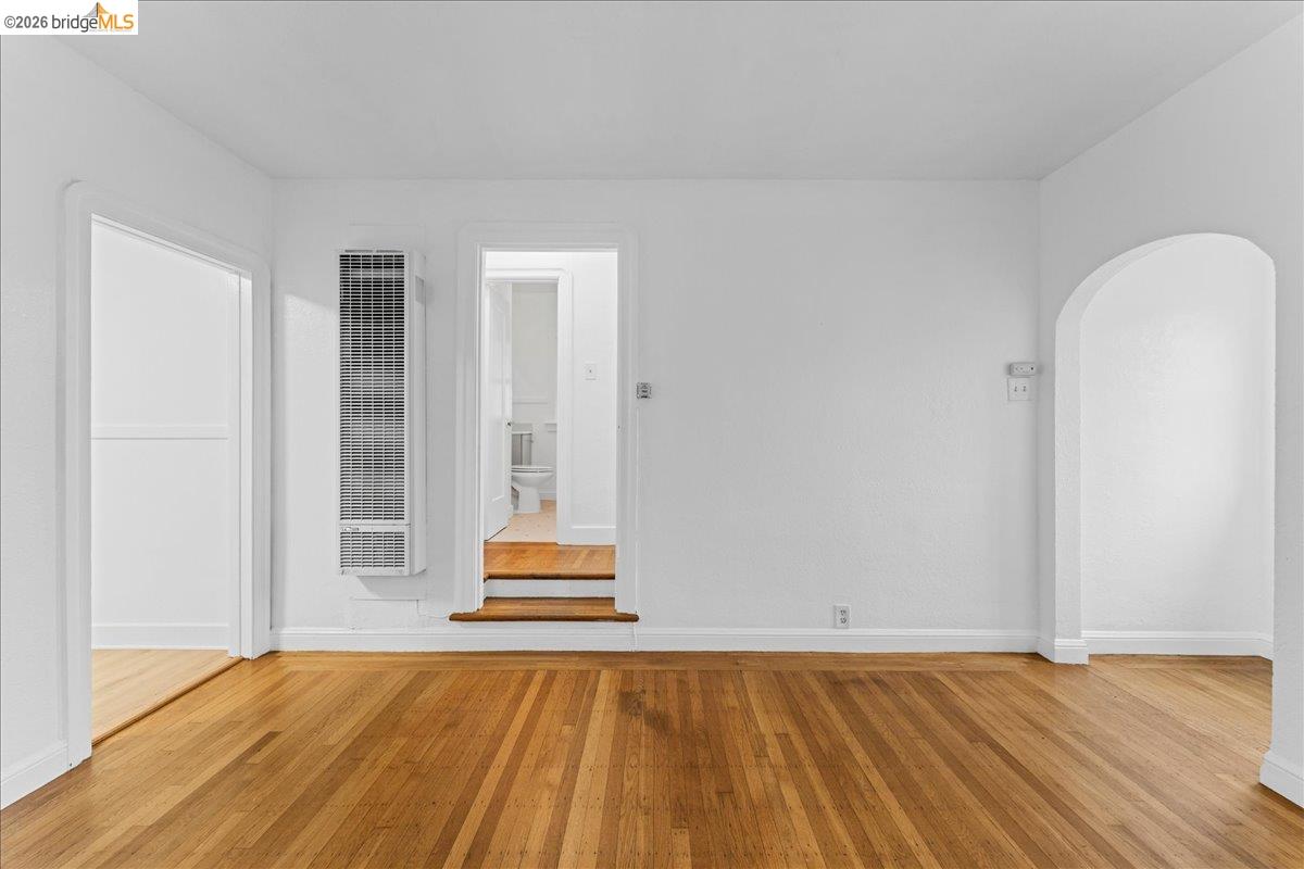 1127 Key Rte Boulevard Albany, CA 94706 - Photo 32 of 36 a view of empty room with wooden floor