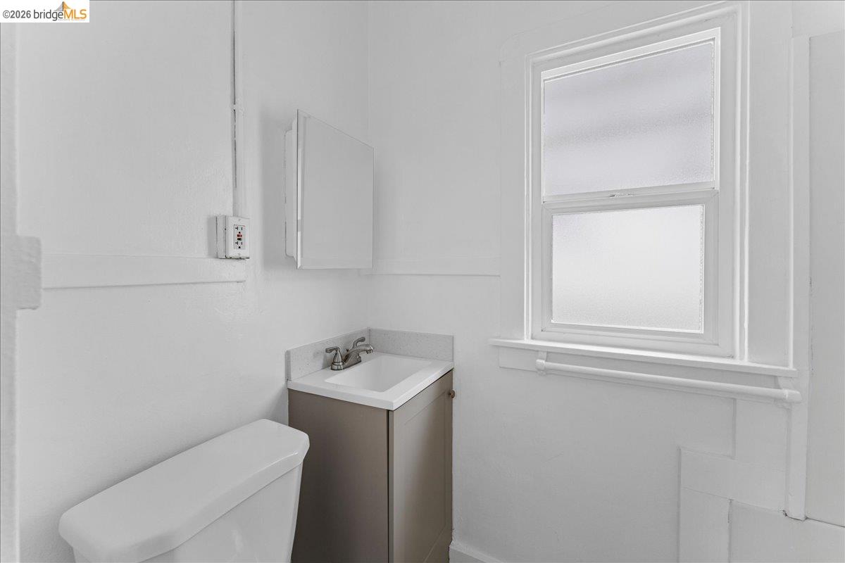1127 Key Rte Boulevard Albany, CA 94706 - Photo 6 of 36 Half bath with vanity and toilet