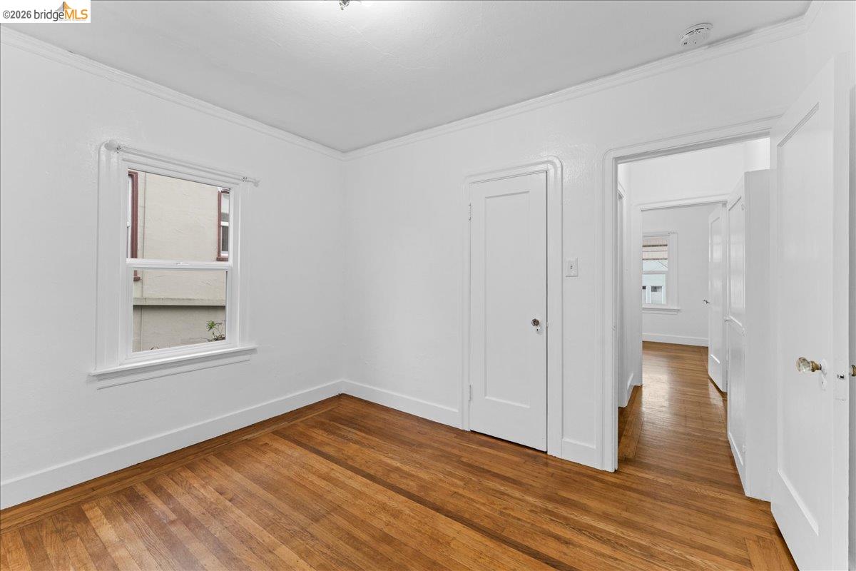 1127 Key Rte Boulevard Albany, CA 94706 - Photo 8 of 36 wooden floor in an empty room