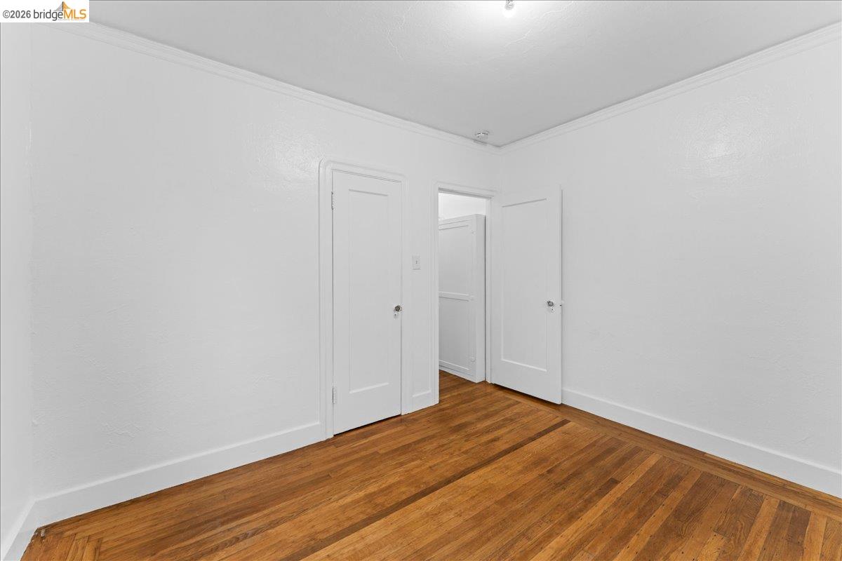 1127 Key Rte Boulevard Albany, CA 94706 - Photo 9 of 36 a view of empty room with wooden floor