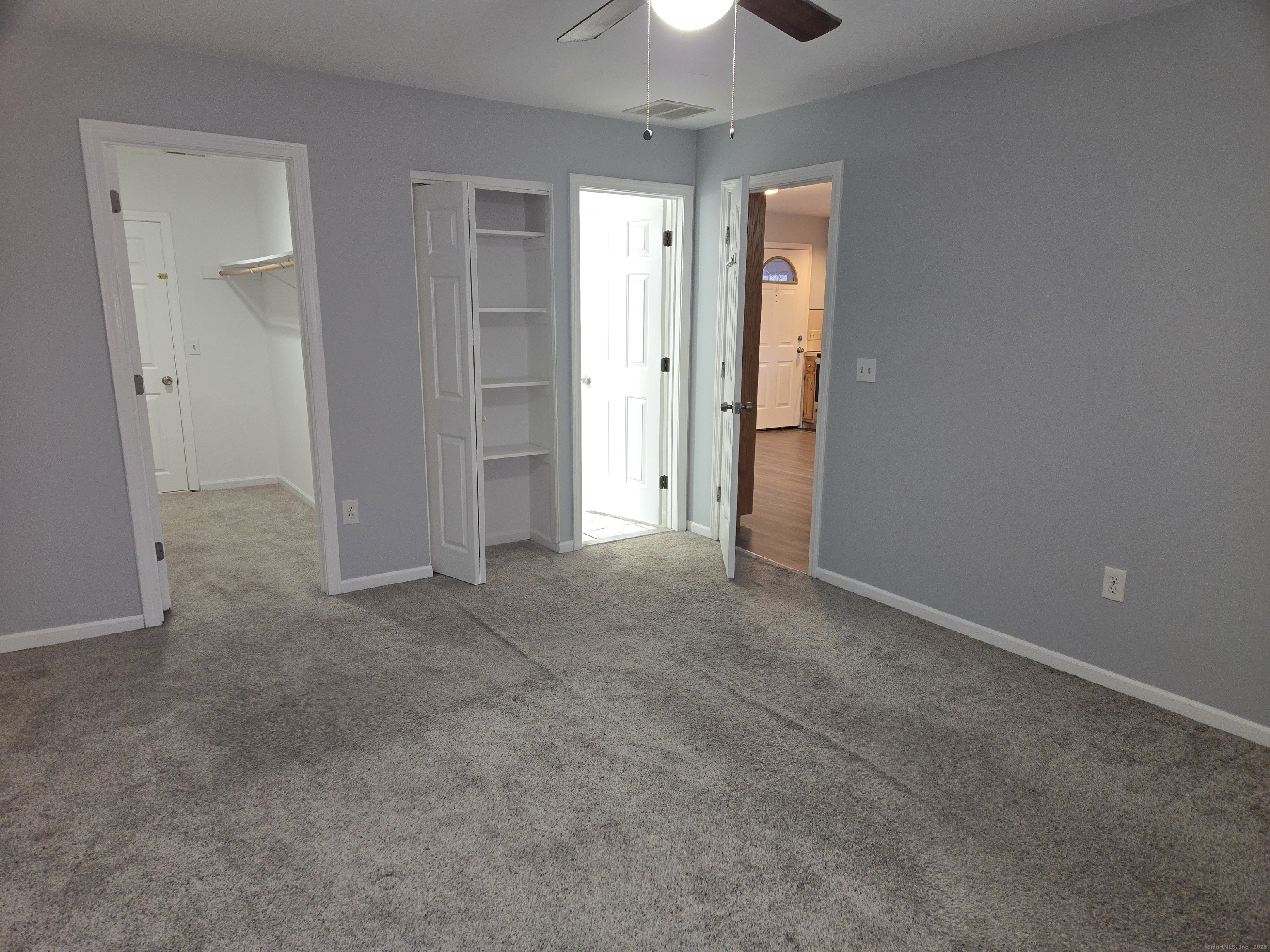 329 Mohegan Road, Unit A Shelton, CT 06484 - Photo 5 of 12 an empty room with closet and entryway