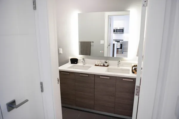 a bathroom with a sink and a mirror