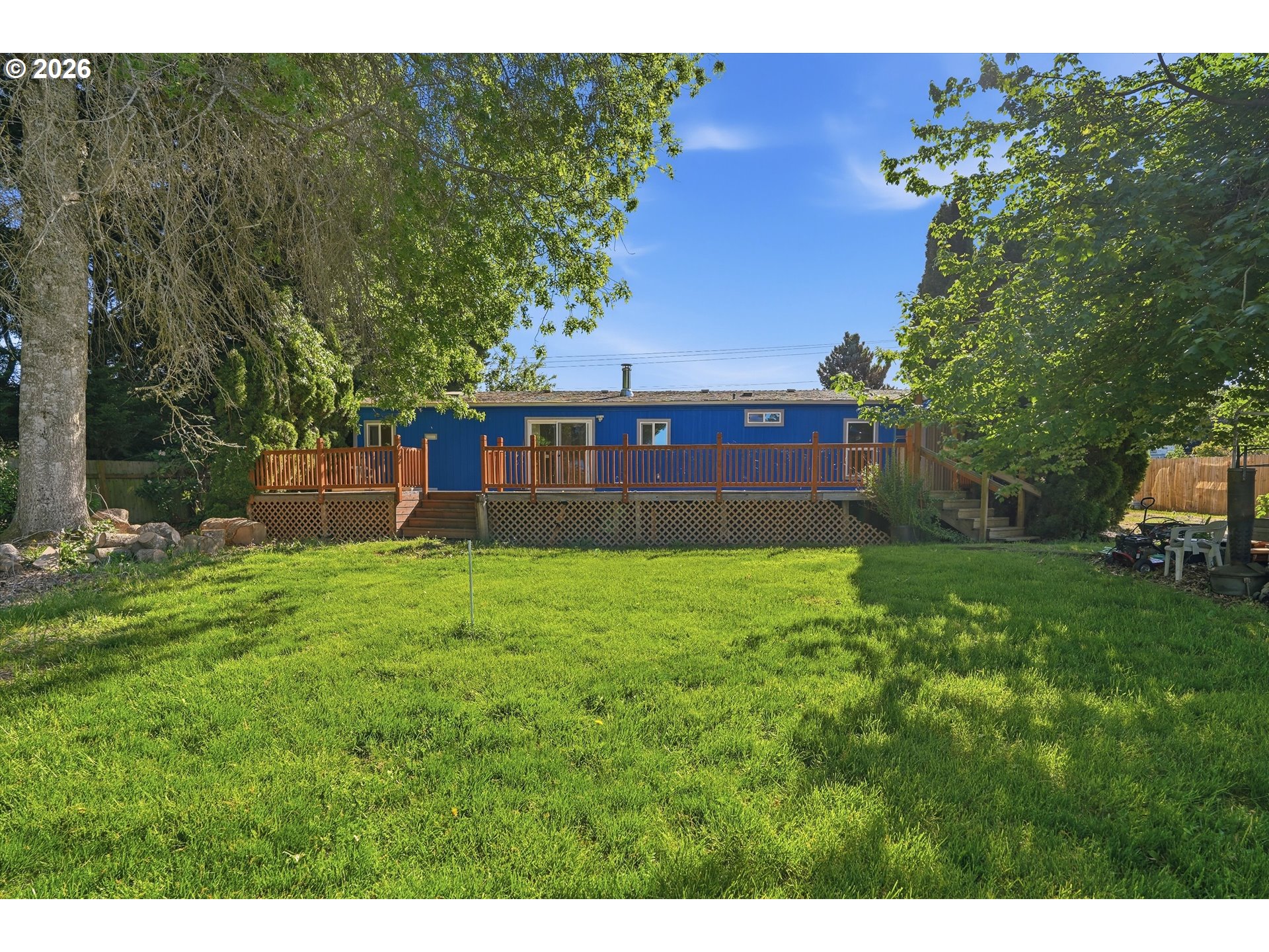 11661 Southwest Spring Hill Road Gaston, OR 97119 - Photo 35 of 45 a view of a house with a backyard